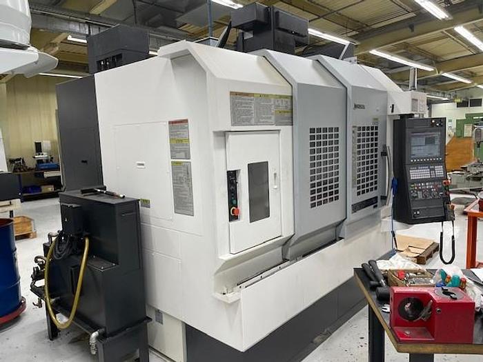 Used Okuma  Genos M560-V-e vertical machining center