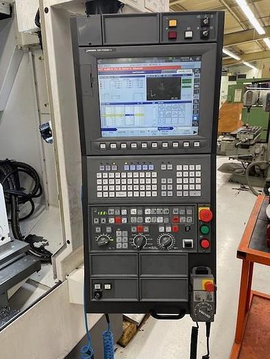 Used Okuma  Genos M560-V-e vertical machining center