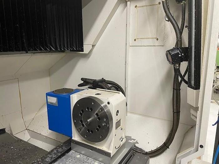 Used Okuma  Genos M560-V-e vertical machining center