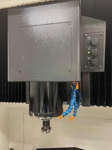 Used Okuma  Genos M560-V-e vertical machining center