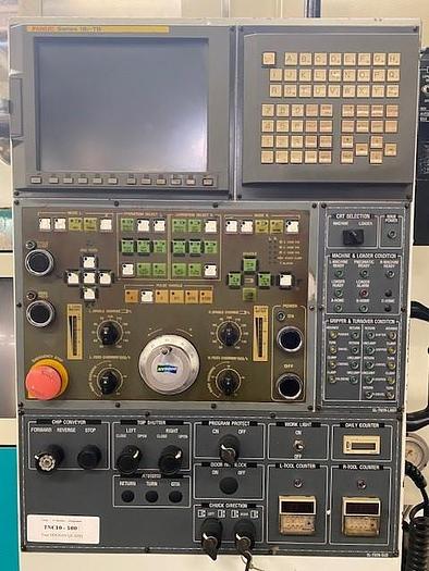 Used 2005 DOOSAN  QL300H twin CNC facing lathe - twin CNC center lathe