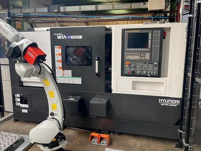 Used HYUNDAI WIA  HD2200SY CNC lathe twin spindles with robot, milling and Y axis