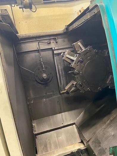 Used 2005 DOOSAN  QL300H twin CNC facing lathe - twin CNC center lathe