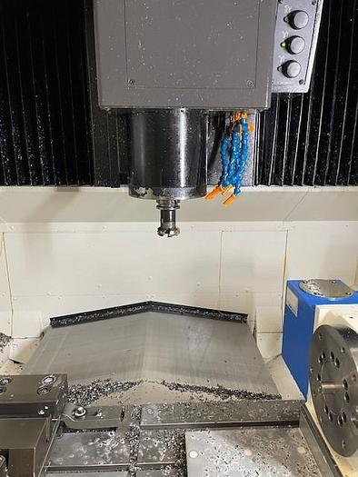 Used Okuma  Genos M560-V-e vertical machining center