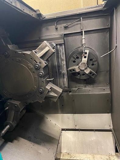 Used 2005 DOOSAN  QL300H twin CNC facing lathe - twin CNC center lathe