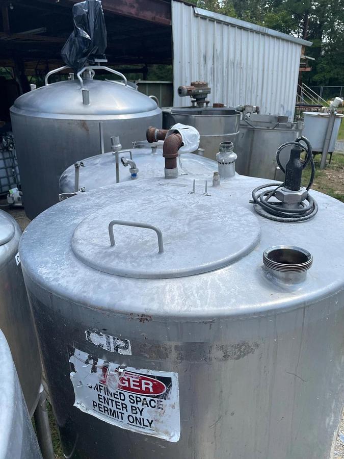 Used Quanity 2 Stainless Steel CIP Tanks, 200 Gallons each. 90” High x 30” diameter