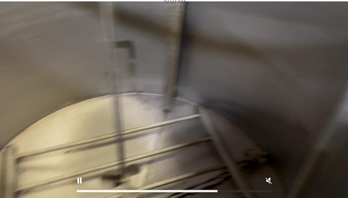 Used 600 Gallon Stainless Steel Tank Open Top, Cone Bottom , Top Center Mounted Mixer