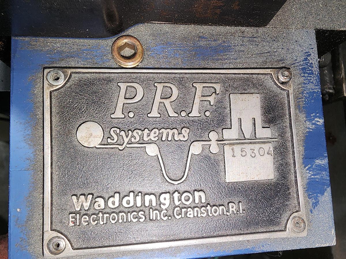 Used 6" WIDE PRF/WADDINGTON PRESS MOUNTED FEEDER
