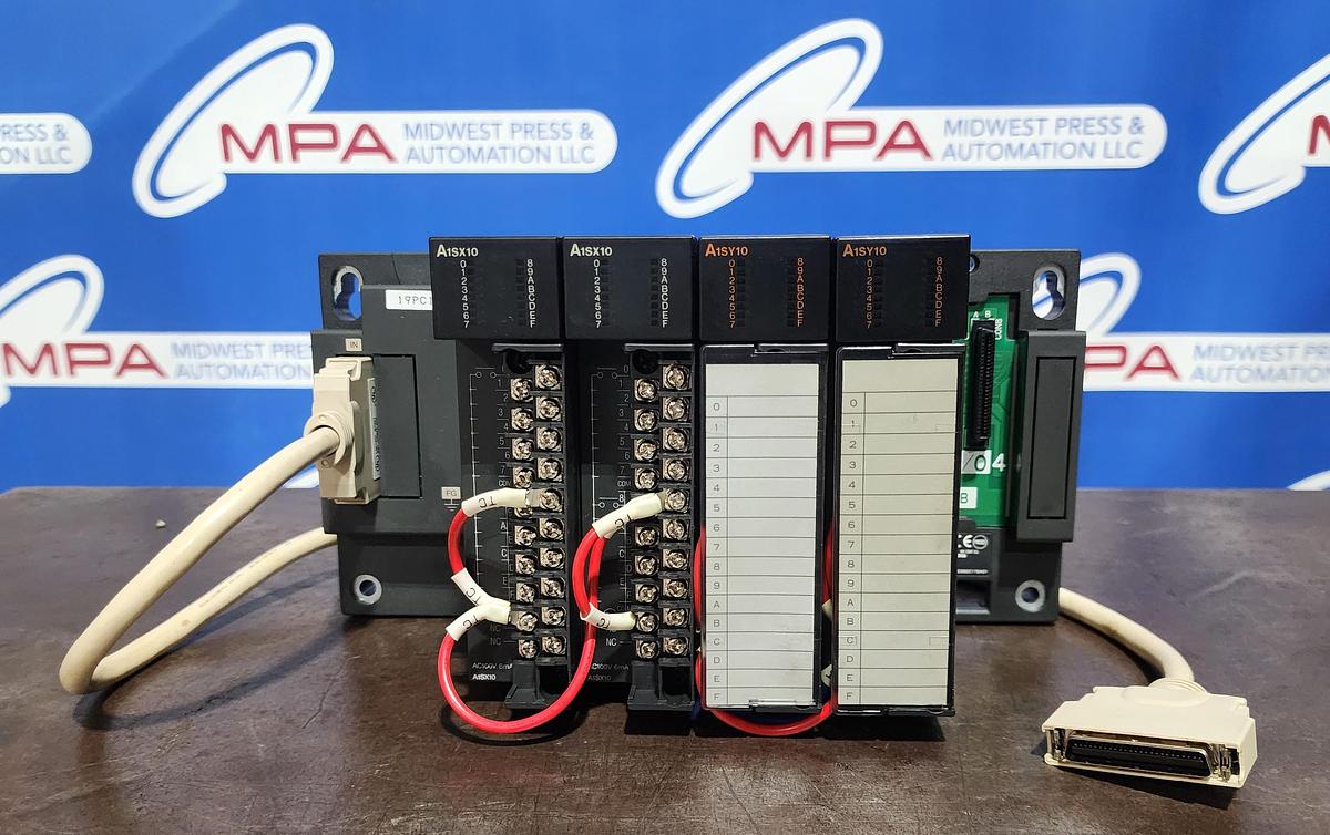 Used Mitsubishi Base Unit A1S55B w (2) A1SX10 Inputs & (2) A1SY10 Output Units Programmable Controller