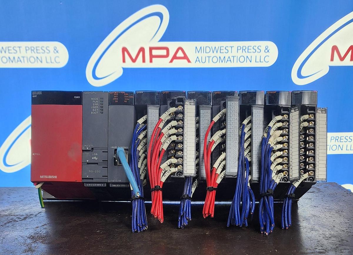 Used Mitsubishi Q38B / Q61P / Q02HCPU / QJ71E71-100 / QY22 / QX80 / QY22 / QX40 / QY40P 8 Slot PLC