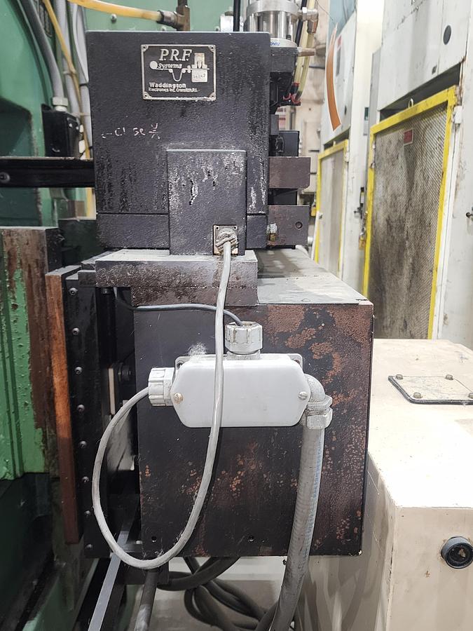 Used 12" WIDE PRF/WADDINGTON PRESS MOUNTED FEEDER