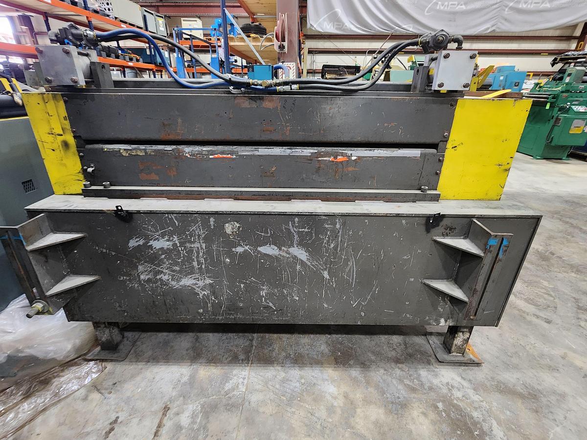 Used 60" WIDE COE FEEDER