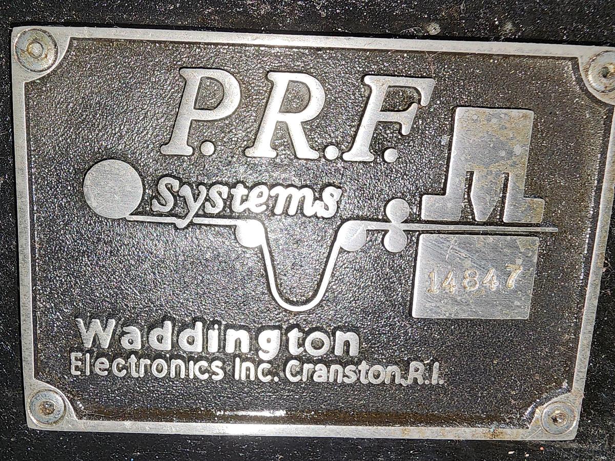 Used 12" WIDE PRF/WADDINGTON PRESS MOUNTED FEEDER