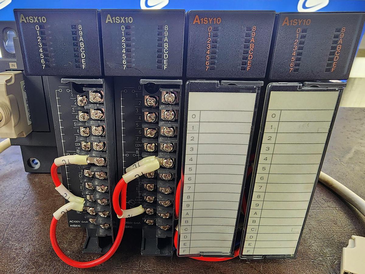 Used Mitsubishi Base Unit A1S55B w (2) A1SX10 Inputs & (2) A1SY10 Output Units Programmable Controller
