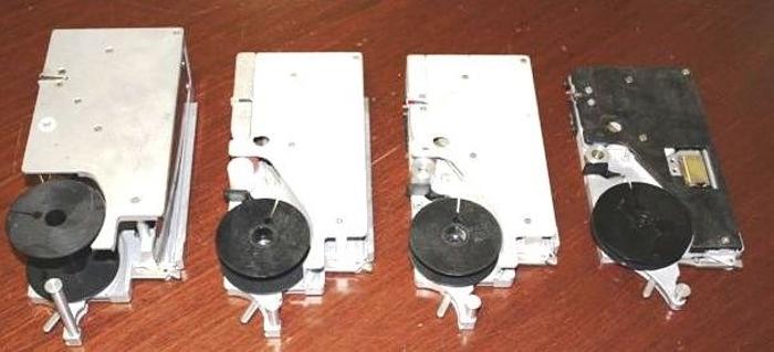 Used Quad tape and reel feeders - several models and most sizes