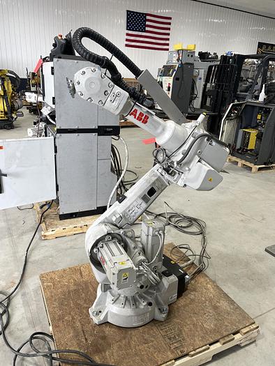 Used ABB IRB 2600-12/1.65 ROBOT WORK CELL CONSISTING OF 2 IRB 2600 ROBOTS RUNNING OFF OF 1 IRC5 CONTROLLER
