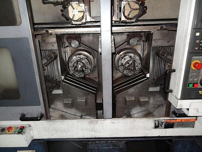 Used MORI SEIKI RL253 TWIN SPINDLE CNC CHUCKER WITH GANTRY LOADER