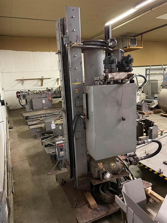 High speed bright can Whallon palletizer