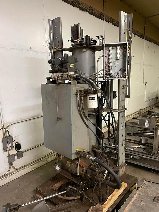 High speed bright can Whallon palletizer
