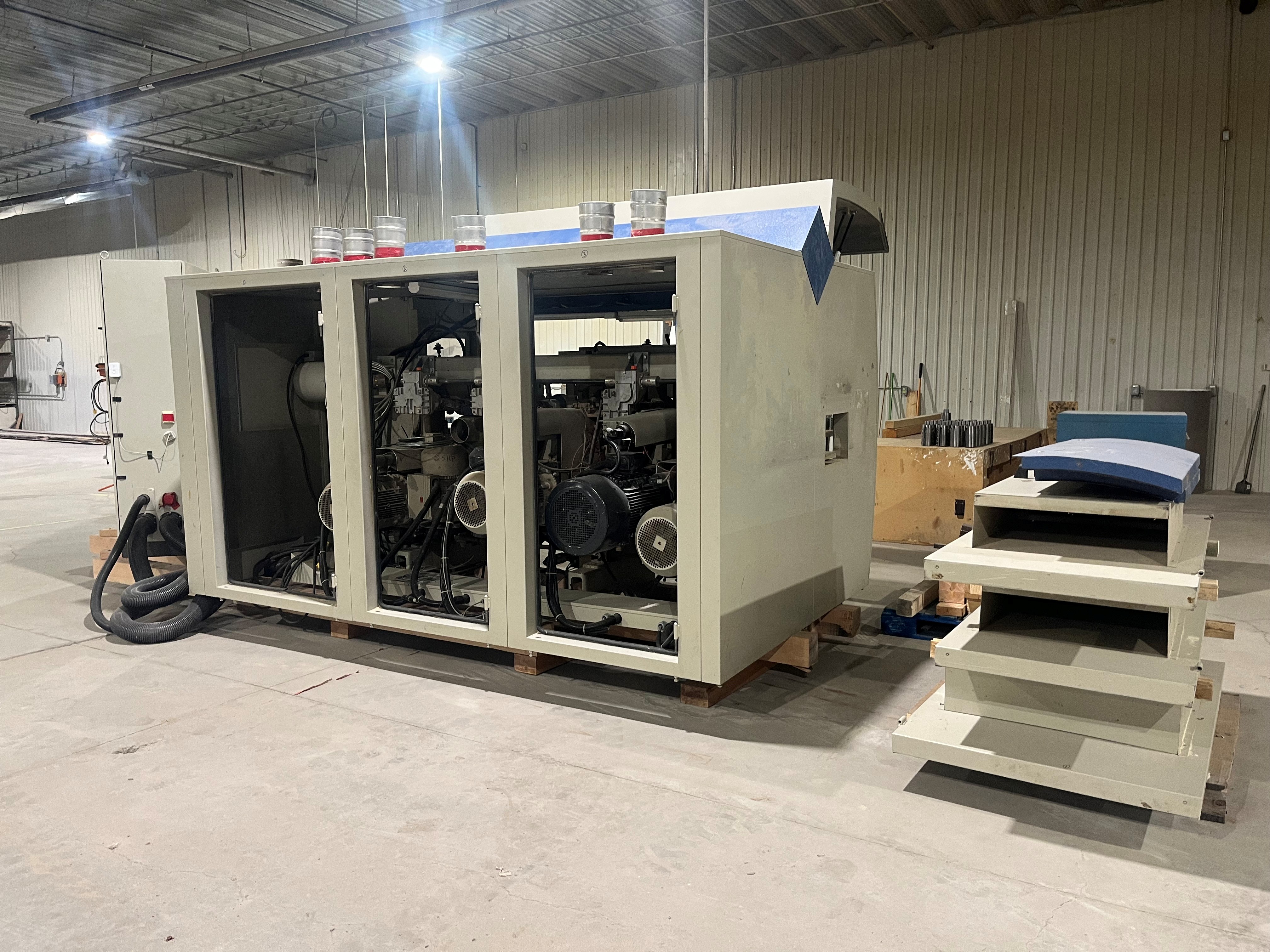 Used 2005 Weinig  Powermat 1000 6-Head Moulder With Assorment of Cutterheads