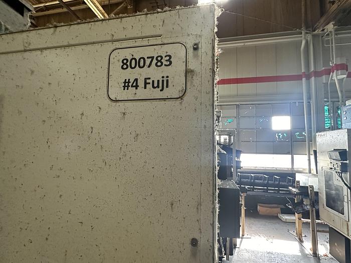 Used FUJI ANW 35 TWIN TURRET CNC LATHE, TAIL STOCK WITH ROBOT LOAD/UNLOAD AND STOCKER TABLES