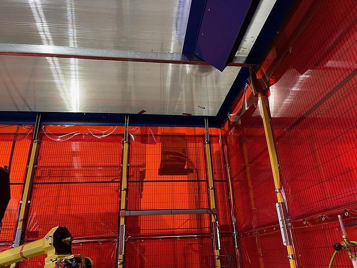 Used FANUC NEVER USED DUAL ARM ARCMATE 100iC/8L ROBOTIC WELDING CELL WITH R30iB CONTROLLERS, ENCLOSURE,     HEADSTOCK/TAIL STOCK, ROBOVENT HOOD