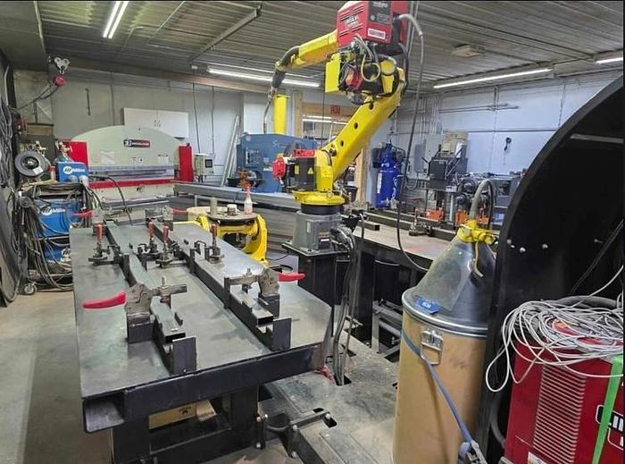Used FANUC ArcMate 120iC/10L with R30iA Controller and Lincoln Electric R500 Dual Table and Rotary Table Welding Cell