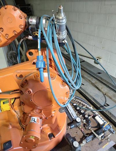 Used ROBOTIC LASER CELL, USING AN ABB IRB 2400 robot / 2005 GSI Lumonics JK745TR nd Yag laser rated at 150J / 850 watts.ONLY 744 HOURS!