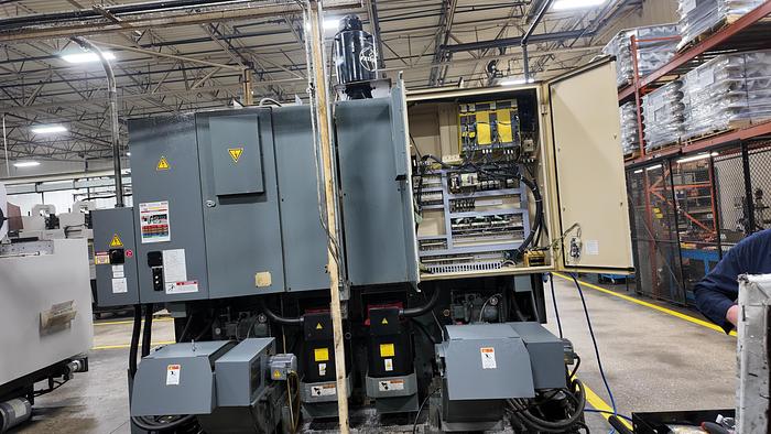 Used OKUMA HOWA 2SP-V40 TWIN SPINDLE VERTICAL TURRET LATHE