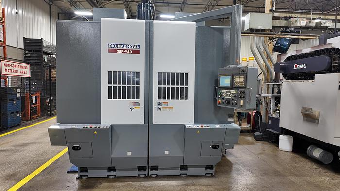 Used OKUMA HOWA 2SP-V40 TWIN SPINDLE VERTICAL TURRET LATHE