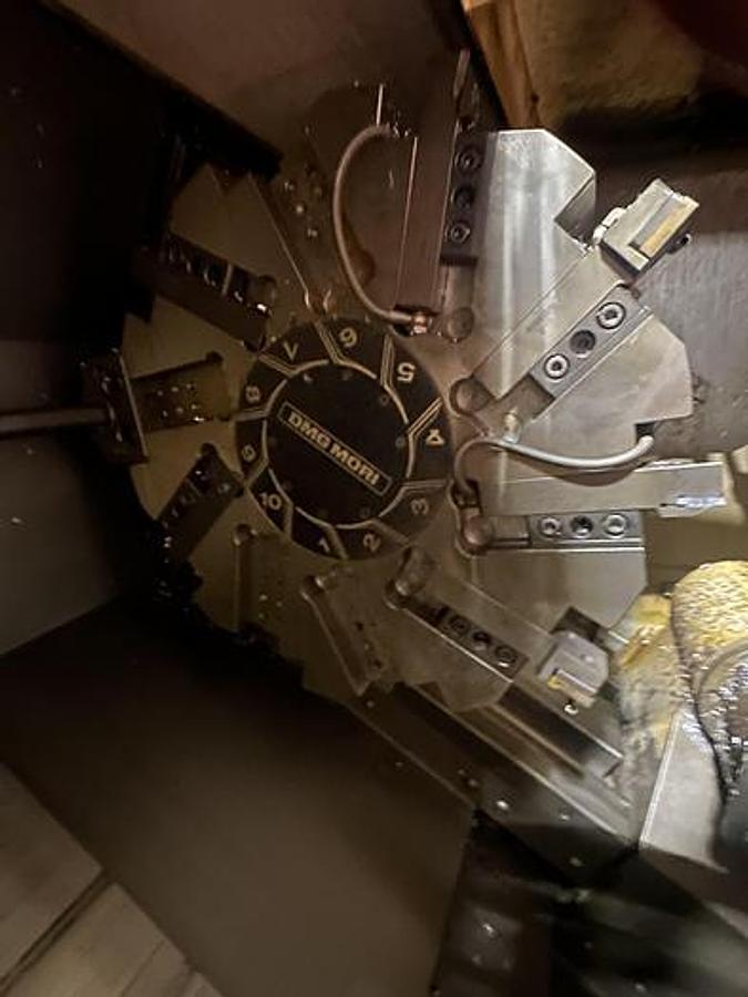 Used DMG MORI NLX 2500/700 2 AXIS CNC LATHE WITH CHIP BLASTER AND CONVEYOR