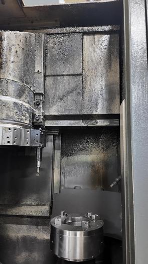 Used OKUMA HOWA 2SP-V40 TWIN SPINDLE VERTICAL TURRET LATHE