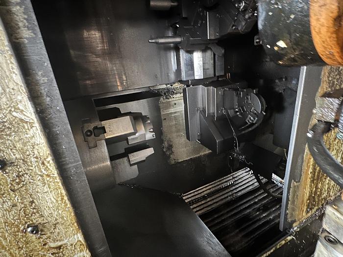 Used 2013 FUJI ANW 35 TWIN TURRET CNC LATHE, TAIL STOCK WITH ROBOT LOAD/UNLOAD AND STOCKER TABLES