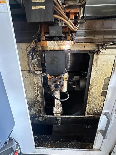 Used FUJI ANW 35 TWIN TURRET CNC LATHE, TAIL STOCK WITH ROBOT LOAD/UNLOAD AND STOCKER TABLES