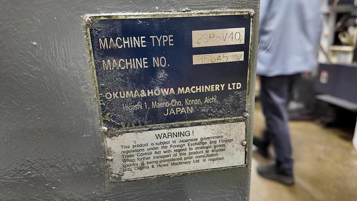 Used OKUMA HOWA 2SP-V40 TWIN SPINDLE VERTICAL TURRET LATHE