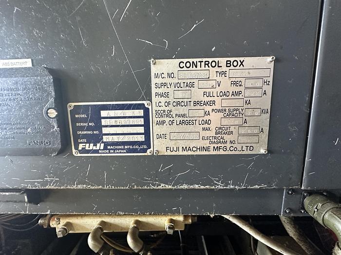 Used FUJI ANW 35 TWIN TURRET CNC LATHE, TAIL STOCK WITH ROBOT LOAD/UNLOAD AND STOCKER TABLES