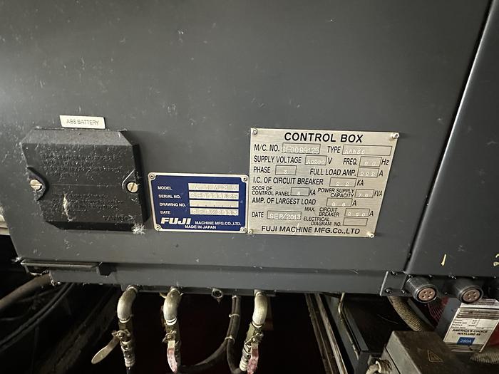 Used FUJI ANW 35 TWIN TURRET CNC LATHE, TAIL STOCK WITH ROBOT LOAD/UNLOAD AND STOCKER TABLES