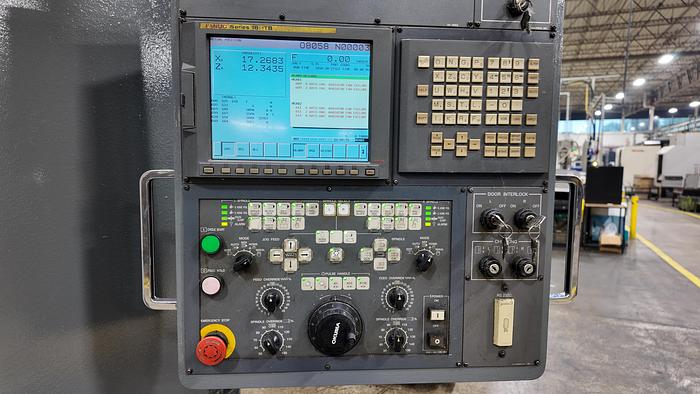 Used OKUMA HOWA 2SP-V40 TWIN SPINDLE VERTICAL TURRET LATHE