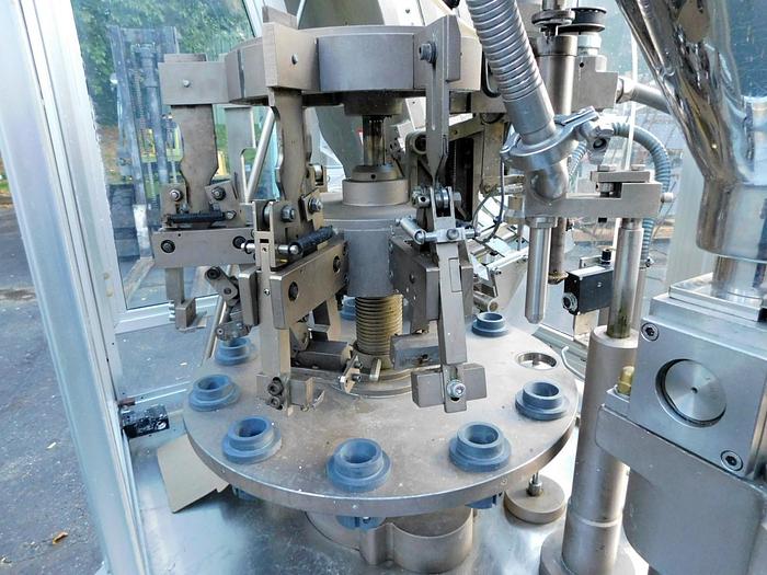 Used COMADIS C 100 S METAL TUBE FILLER