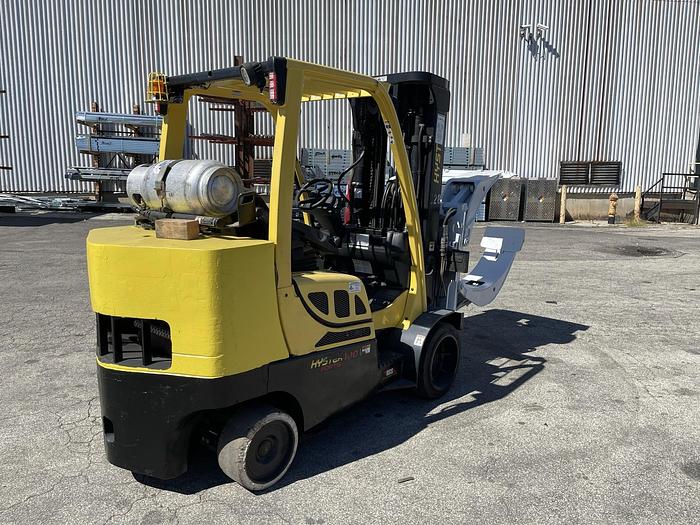 Used 10,000 POUND HYSTER MODEL S100FTBCS FORKLIFT WITH 64" DIAMETER CASCADE CLAMP