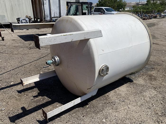 Used Used approximately 700 gallon stainless steel vertical tank