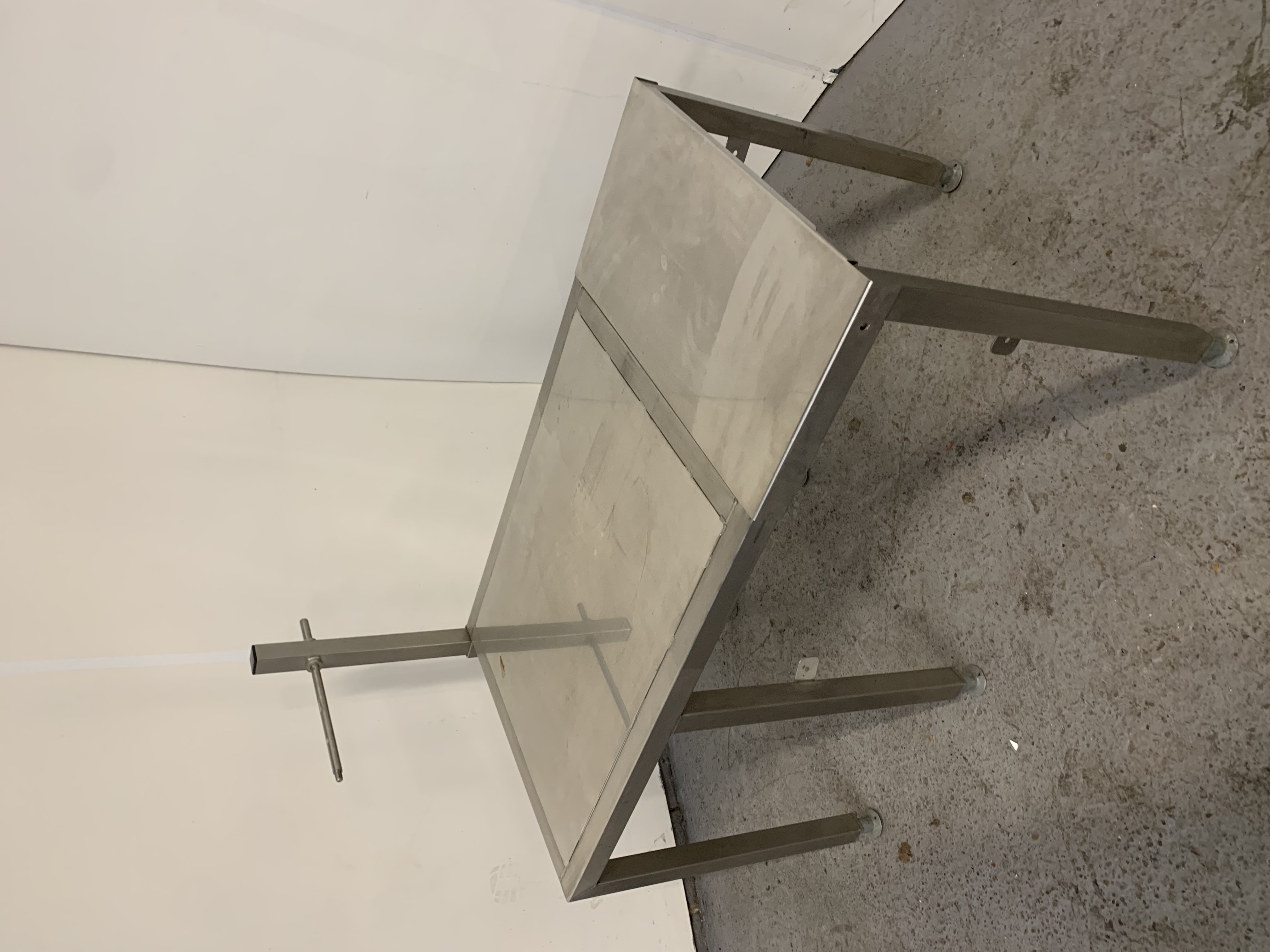 Used Used Stainless Steel Table with Sliding Top.