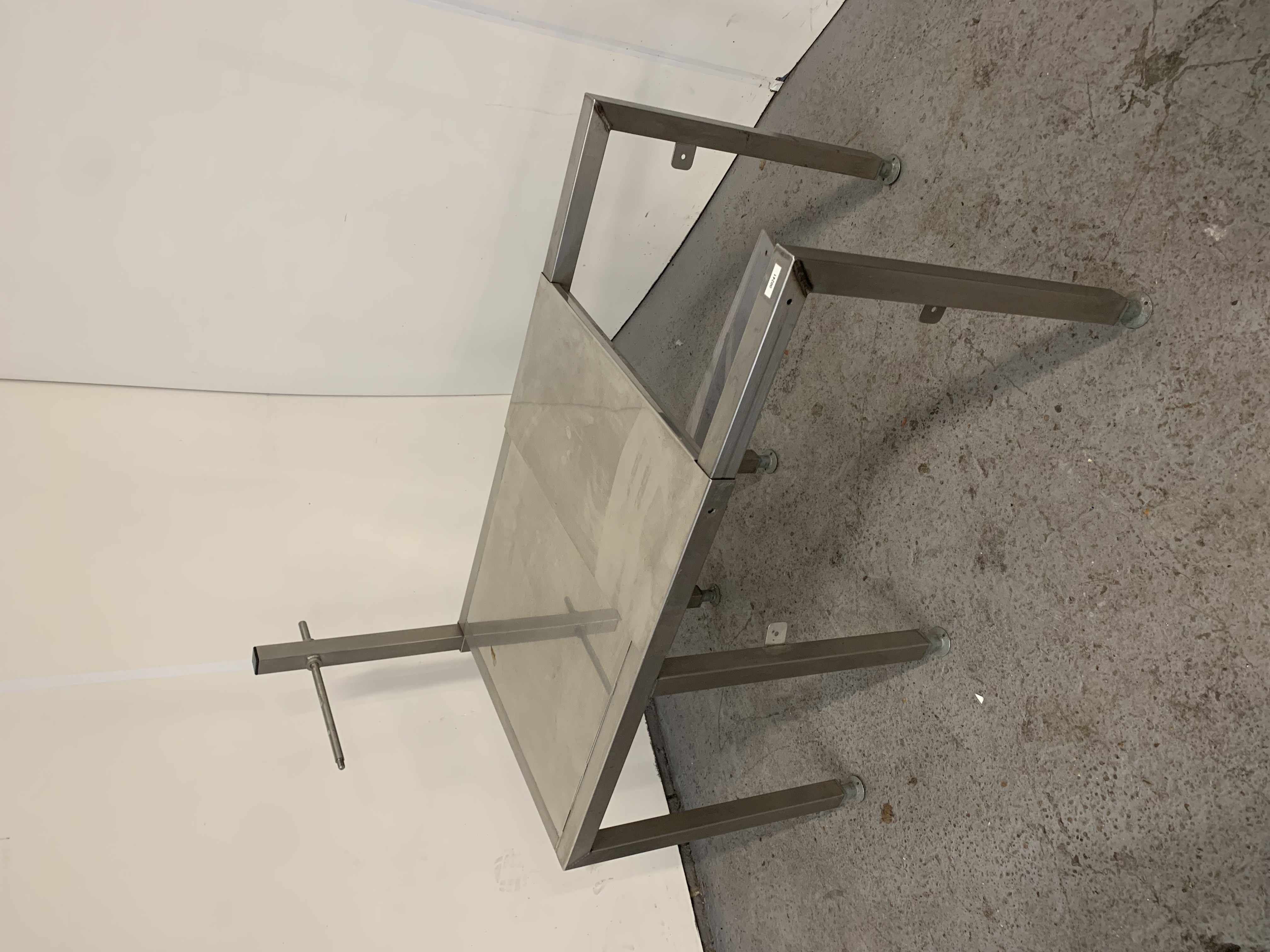 Used Used Stainless Steel Table with Sliding Top.