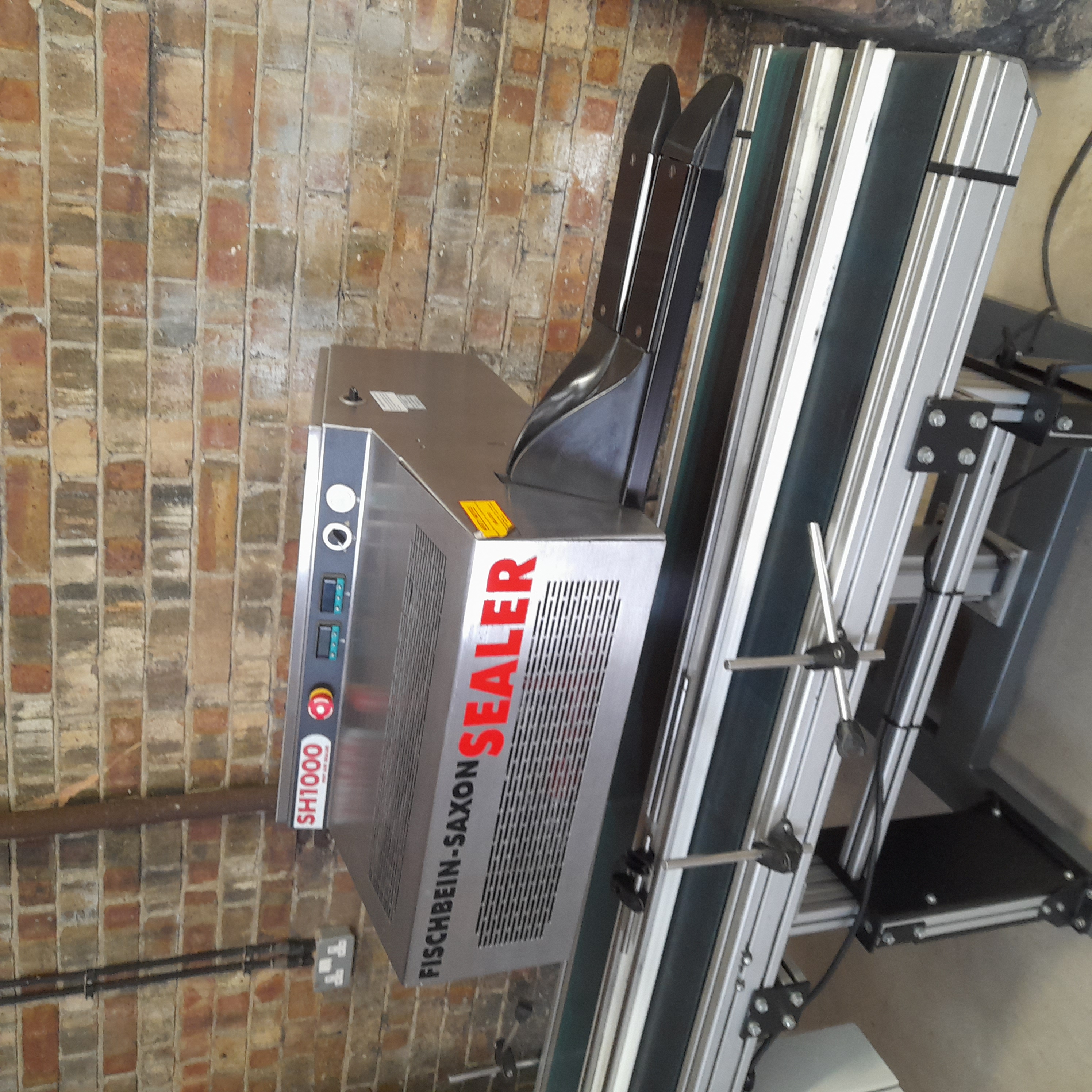 Used Fischbein Saxon Bag Sealer