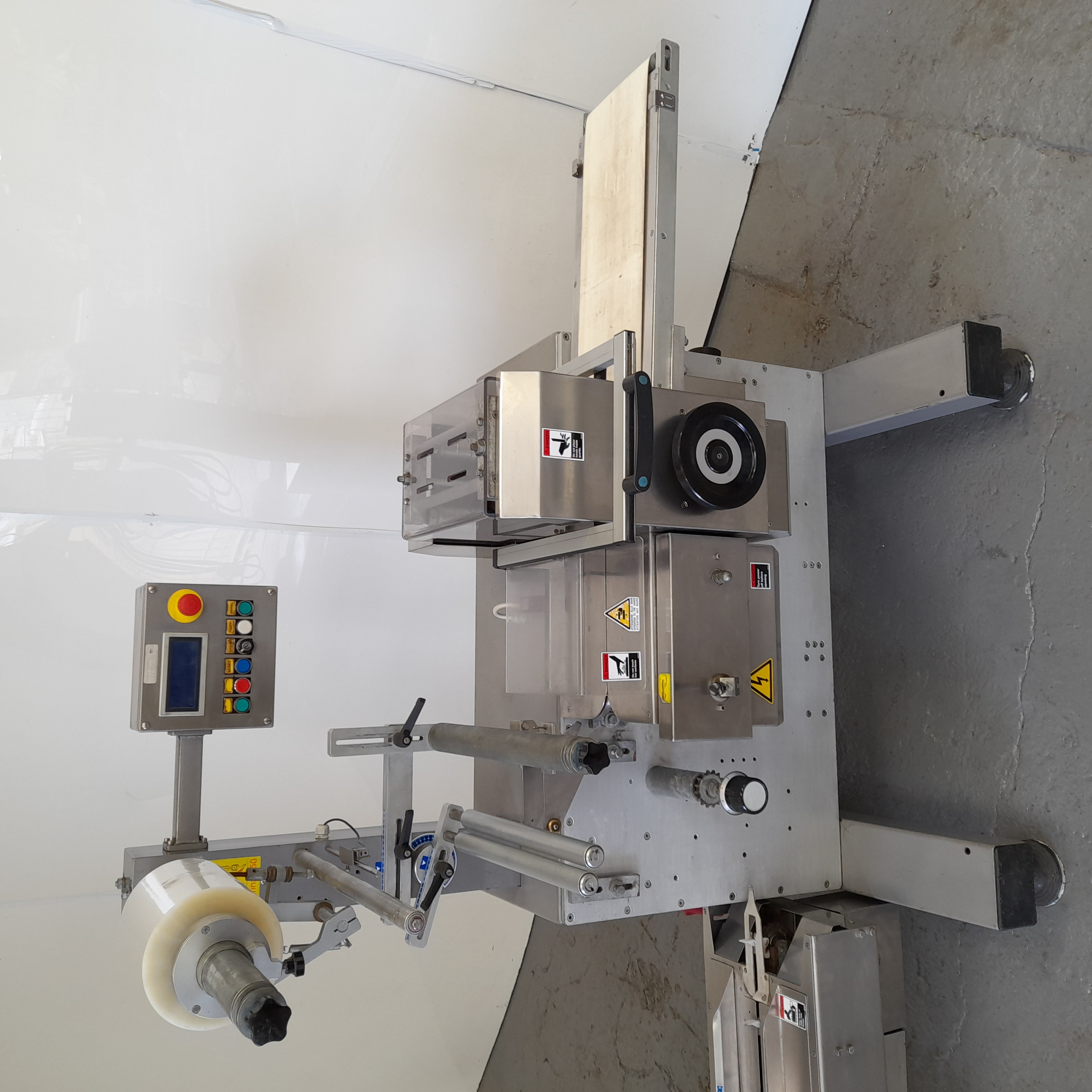 Used Delfin Flowpack with Conveyor