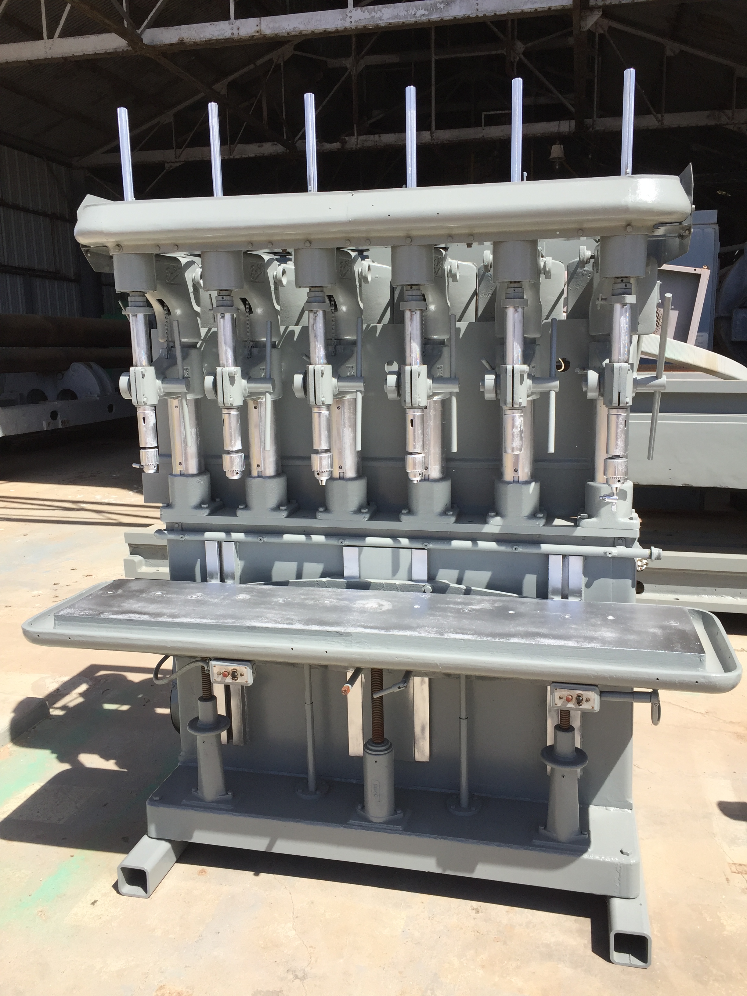 Used 6 Spindle Buffalo Production Drill; #2 MT; 14” x 66” Tbl;