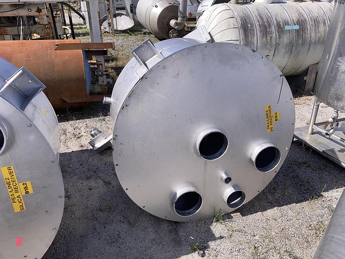 Used Used approximately 220 gallon stainless steel vertical tank