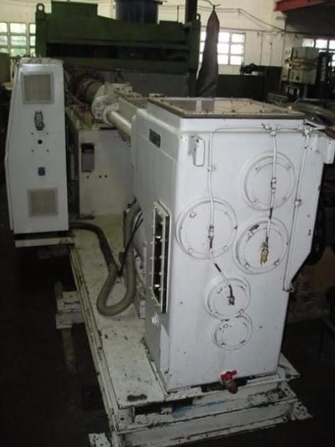 Refurbished KRAUSS MAFFEI KMD90 twin screw priofile extruder