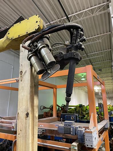 Used LINCOLN SYSTEM 55 WITH FANUC M710iC/20L TORCH CUTTING CELL WITH DUAL ROLL IN ROLL OUT TABLES