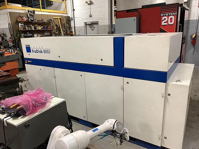 Used LINCOLN ELECTRIC  IRB 2400 ROBOTIC LASER WELDING CELL WITH DUAL ABB IRBP 2000L DUAL TRUNNIONS